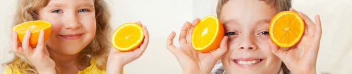 a collage of a girl holding oranges